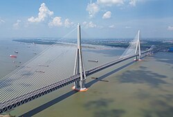 The Changtai Yangtze River Bridge in Jiangsu province, China has a main span of 1,176 metres (3,858 ft), the world's longest cable-stayed bridge span as of 2026.