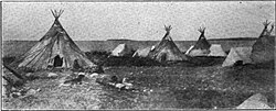 Tipis of the Tłı̨chǫ (Dogrib) First Nations on the shores of Slave Lake at Fort Resolution, circa 1907