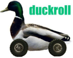 A mallard duck, edited to have car wheels, alongside the text "duckroll".