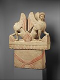 Limestone funerary stele (shaft) surmounted by two sphinxes. Greece, 5th century BC.