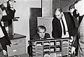 MSFC officials, including Wernher von Braun (on left) looking at an LVDC