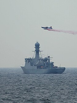 A Pilatus PC-9 simulates an airborne chemical attack against the Royal Danish Navy HDMS Thetis (F357) during BALTOPS '13, on 13 June 2013.