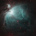 A false color 4-panel mosaic of the Orion Nebula, with near infrared data in the red channel and H-alpha data in the green and blue channels, taken with an 8" f/8 Ritchey–Chrétien telescope and monochrome camera with filters.