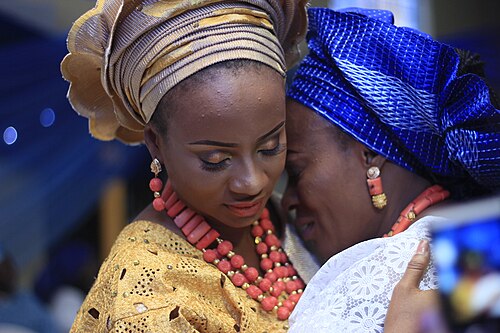 Yoruba Women in Gele, a traditional type of headscarf (Iborun) of Yoruba ladies