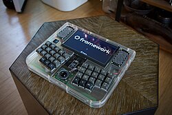 Framedeck, a Framework motherboard based cyberdeck with clear acrylic and brass influenced by TRS-80 Model 100[114][115]